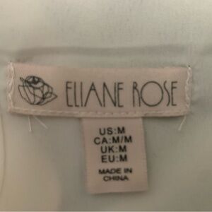 Lush tropical green leaf printed camisole with lining .